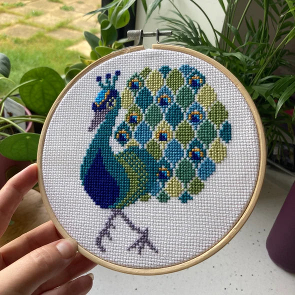 Peppa Peacock